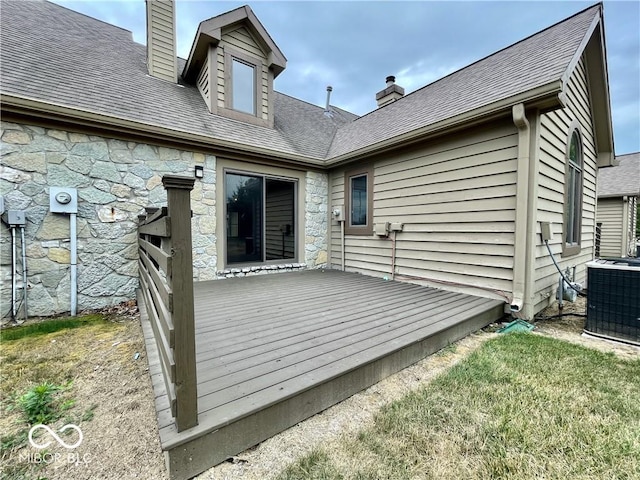 35 Northridge Ct, Brownsburg, IN 46112 - rear view of property with a chimney, stone siding, and a wooden deck