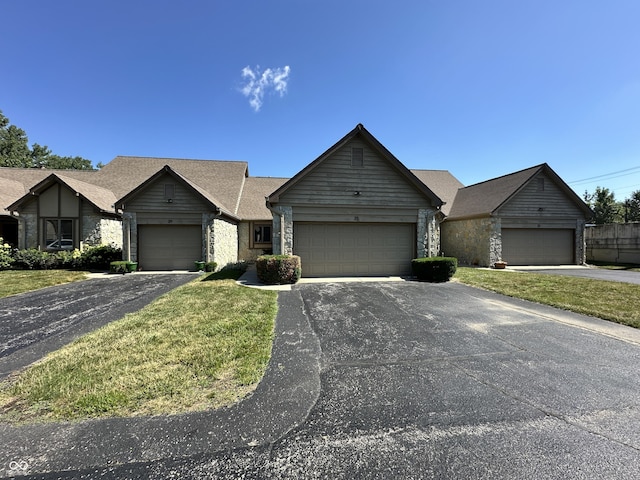 35 Northridge Ct, Brownsburg, IN 46112 - single story home with stone siding, driveway, a front yard, and an attached garage