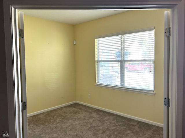 8287 Falkirk Dr, Avon, IN 46123 - unfurnished room featuring dark colored carpet and baseboards