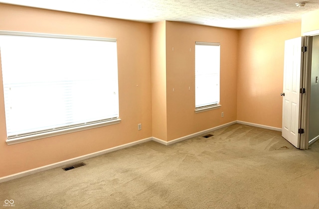 8287 Falkirk Dr, Avon, IN 46123 - carpeted empty room with baseboards and a textured ceiling