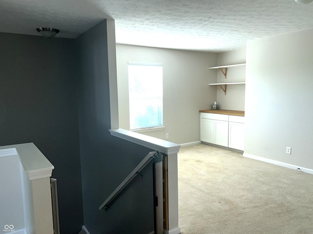 8287 Falkirk Dr, Avon, IN 46123 - interior space featuring light colored carpet and a textured ceiling