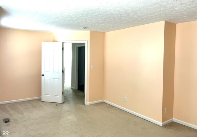 8287 Falkirk Dr, Avon, IN 46123 - spare room with light colored carpet, a textured ceiling, and a smoke detector