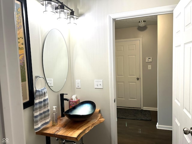 8287 Falkirk Dr, Avon, IN 46123 - bathroom with wood finished floors and baseboards