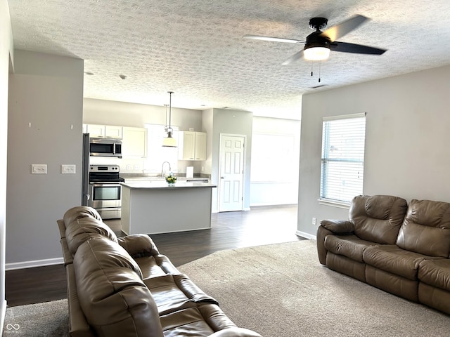 8287 Falkirk Dr, Avon, IN 46123 - living room with dark wood-style floors and a ceiling fan