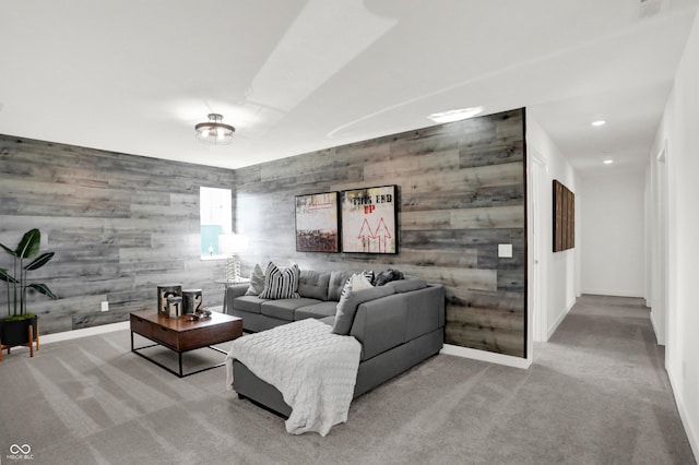 17040 Daly Dr, Noblesville, IN 46062 - living room with light colored carpet, wood walls, and recessed lighting