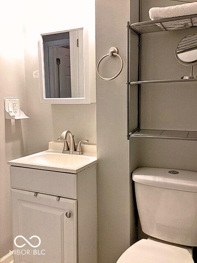 2419 Mars Hill St, Indianapolis, IN 46241 - bathroom featuring vanity and toilet