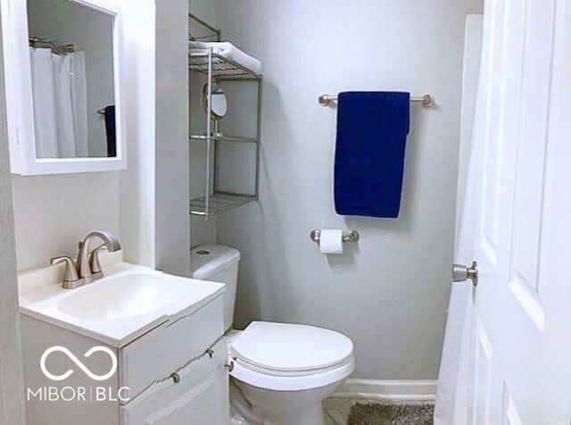 2419 Mars Hill St, Indianapolis, IN 46241 - full bathroom featuring toilet and vanity