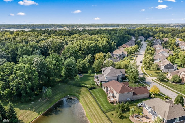 9877 Wading Crane Ave, Fishers, IN 46055 - aerial view of residential area with a nearby body of water and a heavily wooded area