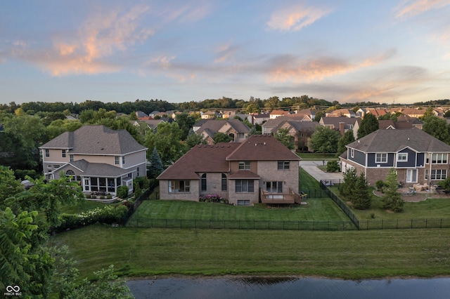 9877 Wading Crane Ave, Fishers, IN 46055 - aerial view at dusk of a residential view and a water view