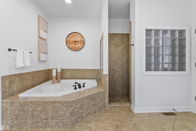 9877 Wading Crane Ave, Fishers, IN 46055 - full bath with a bath, tile patterned floors, and tiled shower