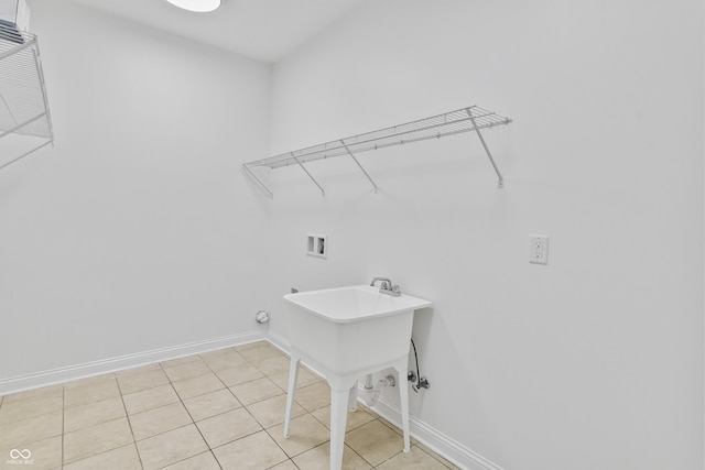 9877 Wading Crane Ave, Fishers, IN 46055 - laundry area with washer hookup and light tile patterned floors