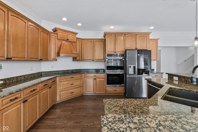 9877 Wading Crane Ave, Fishers, IN 46055 - kitchen featuring stainless steel appliances, custom range hood, ornamental molding, dark wood-style flooring, and recessed lighting