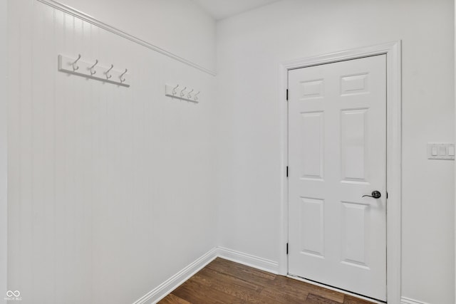9877 Wading Crane Ave, Fishers, IN 46055 - entryway with dark wood-style flooring and baseboards