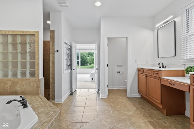 9877 Wading Crane Ave, Fishers, IN 46055 - bathroom with a bath, vanity, tile patterned floors, a tile shower, and recessed lighting