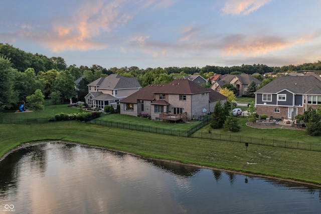 9877 Wading Crane Ave, Fishers, IN 46055 - water view with a fenced backyard and nearby suburban area