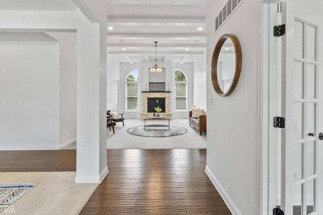 9877 Wading Crane Ave, Fishers, IN 46055 - foyer featuring wood finished floors, a fireplace, and recessed lighting
