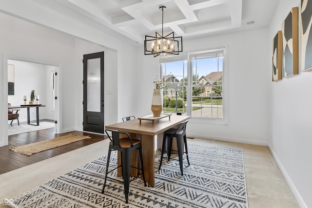 9877 Wading Crane Ave, Fishers, IN 46055 - dining space with a chandelier, coffered ceiling, beamed ceiling, and carpet flooring