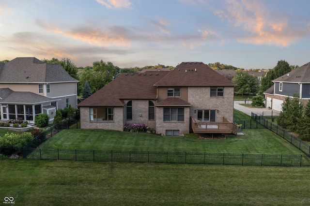 9877 Wading Crane Ave, Fishers, IN 46055 - rear view of house featuring brick siding, a fenced backyard, and a shingled roof