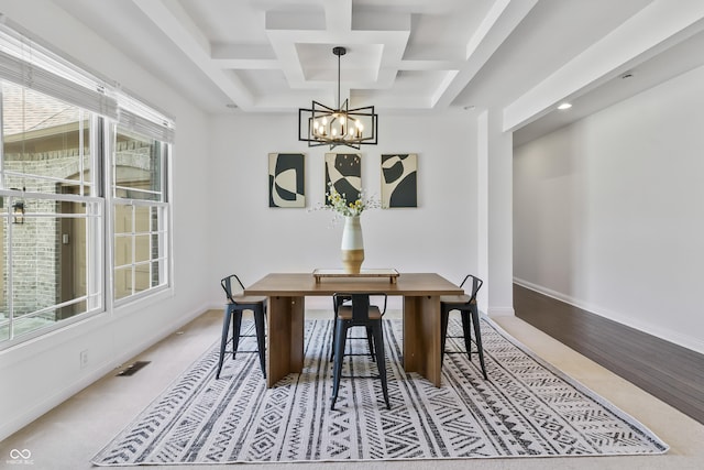 9877 Wading Crane Ave, Fishers, IN 46055 - dining space with a chandelier, coffered ceiling, beamed ceiling, and wood finished floors