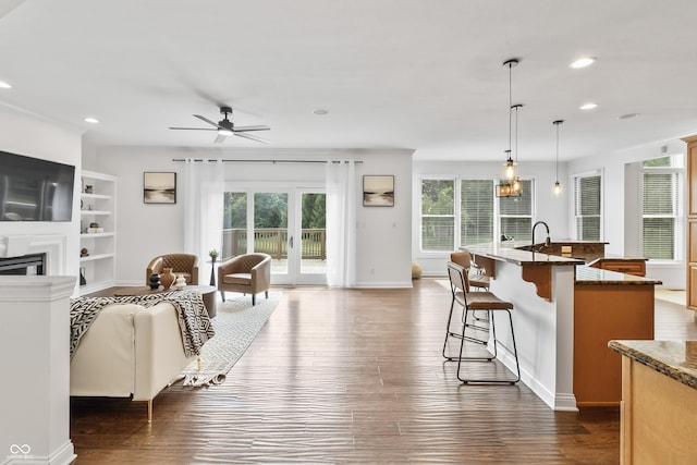 9877 Wading Crane Ave, Fishers, IN 46055 - kitchen with open floor plan, plenty of natural light, a breakfast bar, and recessed lighting