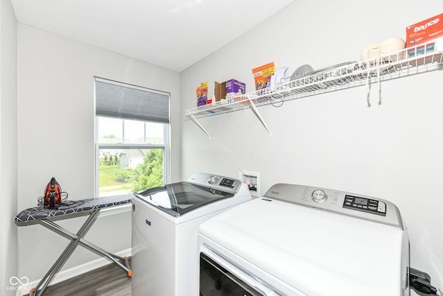 4309 Maize Ln, Whitestown, IN 46075 - laundry room featuring washing machine and clothes dryer and wood finished floors