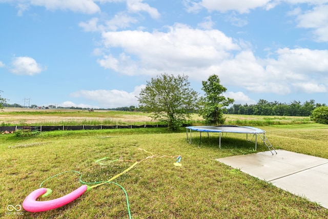 4309 Maize Ln, Whitestown, IN 46075 - view of green lawn featuring a trampoline and a rural view