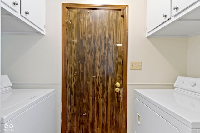4143 E 61st St, Indianapolis, IN 46220 - washroom with washing machine and dryer and cabinet space