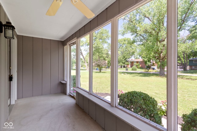 4143 E 61st St, Indianapolis, IN 46220 - unfurnished sunroom featuring a decorative wall and carpet flooring