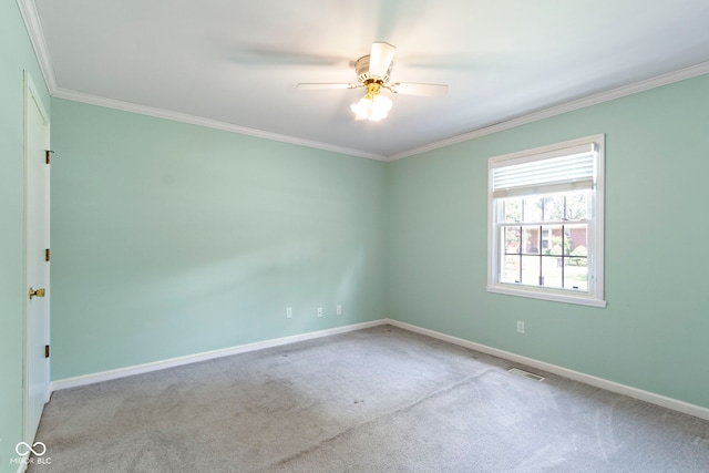4143 E 61st St, Indianapolis, IN 46220 - empty room with ornamental molding, a ceiling fan, and carpet
