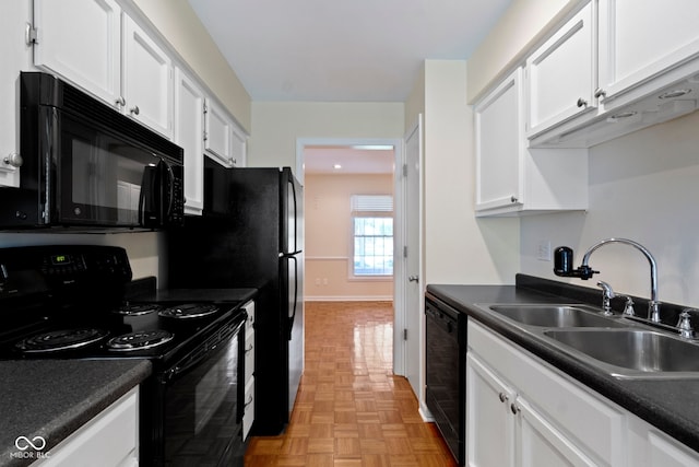 4143 E 61st St, Indianapolis, IN 46220 - kitchen featuring black appliances, white cabinets, and dark countertops