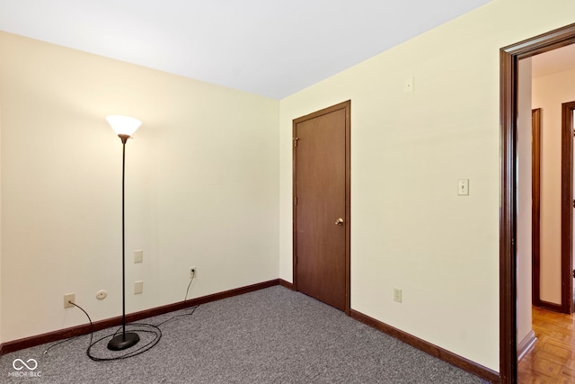 4143 E 61st St, Indianapolis, IN 46220 - spare room with baseboards and light carpet