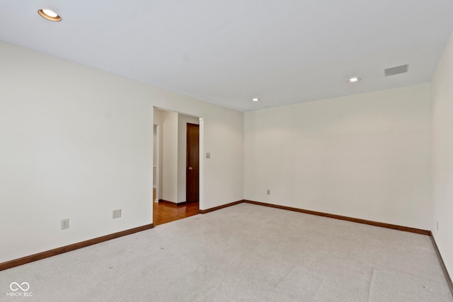 4143 E 61st St, Indianapolis, IN 46220 - unfurnished room with carpet flooring and recessed lighting