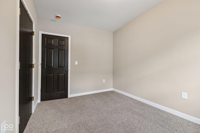 902 Woodrow Ave, Indianapolis, IN 46241 - carpeted spare room featuring baseboards