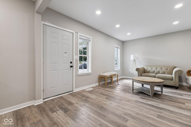 902 Woodrow Ave, Indianapolis, IN 46241 - entryway with wood finished floors and recessed lighting