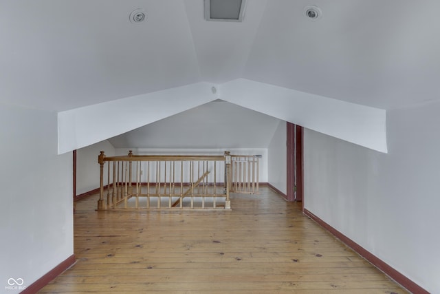 1005 Main St, Beech Grove, IN 46107 - bonus room featuring lofted ceiling and wood-type flooring