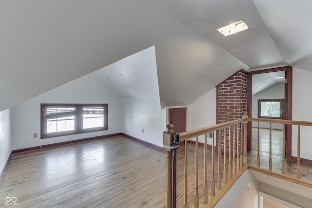 1005 Main St, Beech Grove, IN 46107 - additional living space with lofted ceiling and hardwood / wood-style floors