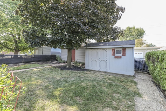1005 Main St, Beech Grove, IN 46107 - view of yard with a storage unit