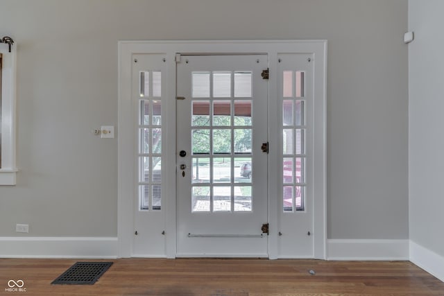 1005 Main St, Beech Grove, IN 46107 - doorway to outside with wood finished floors