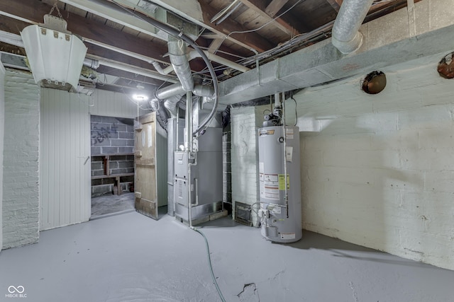 1005 Main St, Beech Grove, IN 46107 - unfinished below grade area featuring water heater and heating unit