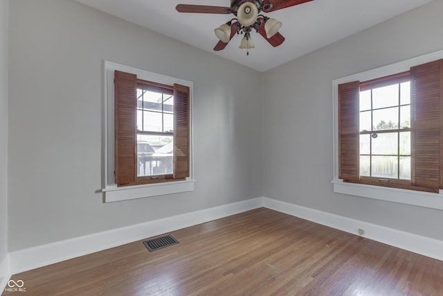 1005 Main St, Beech Grove, IN 46107 - empty room featuring wood finished floors and ceiling fan