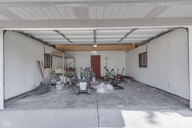 1005 Main St, Beech Grove, IN 46107 - garage featuring a garage door opener