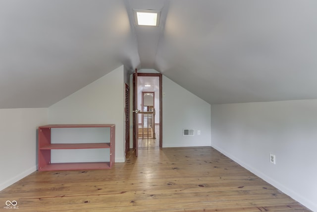 1005 Main St, Beech Grove, IN 46107 - bonus room with vaulted ceiling and hardwood / wood-style flooring