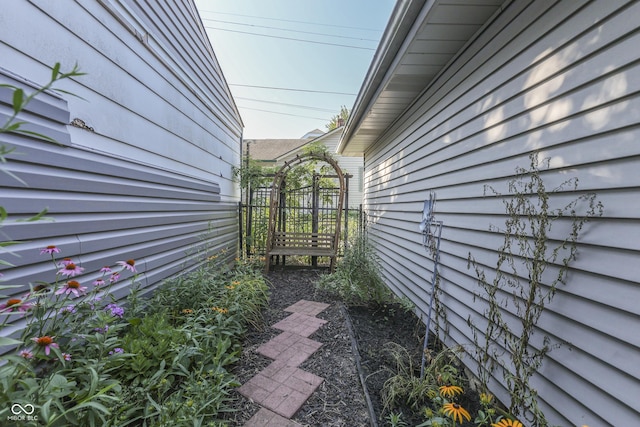 1005 Main St, Beech Grove, IN 46107 - view of side of property with a gate