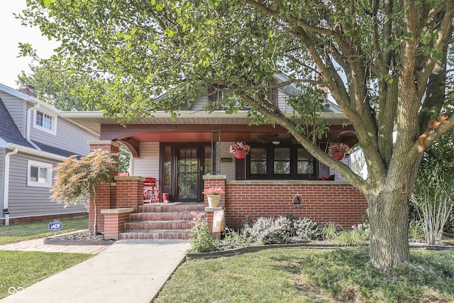 1005 Main St, Beech Grove, IN 46107 - view of front facade with covered porch and brick siding