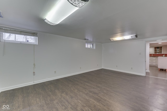 1005 Main St, Beech Grove, IN 46107 - below grade area with dark wood finished floors and plenty of natural light