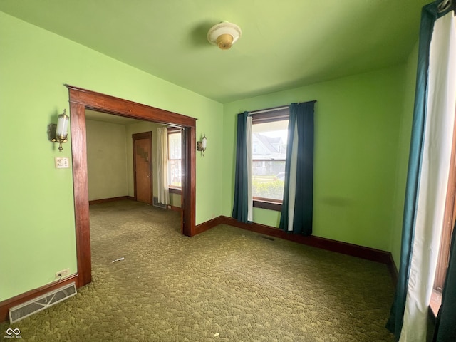 1652 High St, Fort Wayne, IN 46808 - spare room featuring carpet and baseboards
