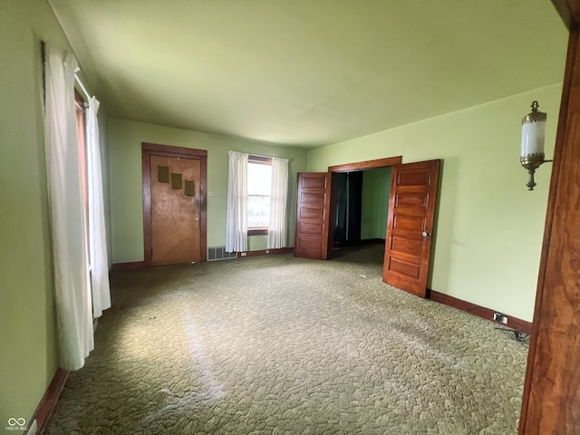 1652 High St, Fort Wayne, IN 46808 - unfurnished bedroom with carpet and baseboards
