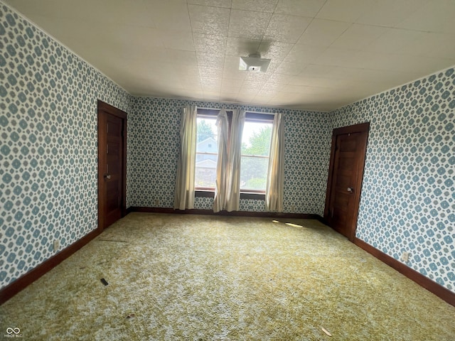 1652 High St, Fort Wayne, IN 46808 - carpeted spare room featuring wallpapered walls
