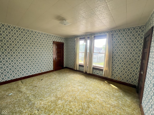 1652 High St, Fort Wayne, IN 46808 - carpeted empty room featuring wallpapered walls