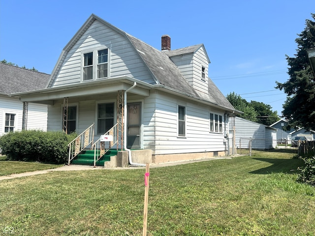 1652 High St, Fort Wayne, IN 46808 - colonial inspired home with a porch, a shingled roof, a gambrel roof, and a chimney